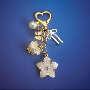 White floral bag charm